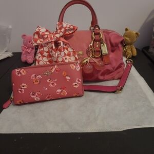 Coach Pink Crossbody Bag with Decorative Bow and Wallet